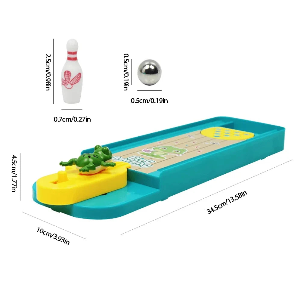 A mini frog bowling game set featuring a wooden lane, yellow ball, and a white bowling pin.