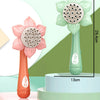A pink and green sunflower bubble maker toy with a flower design and a bubble blower mechanism.
