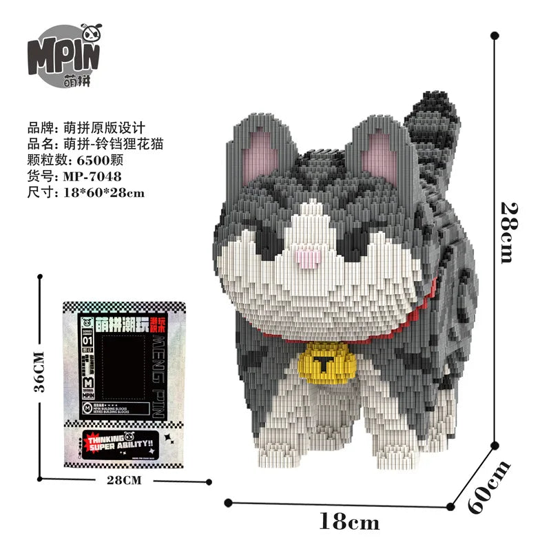 A gray and white bear sculpture made of small building blocks, packaged with instructions.