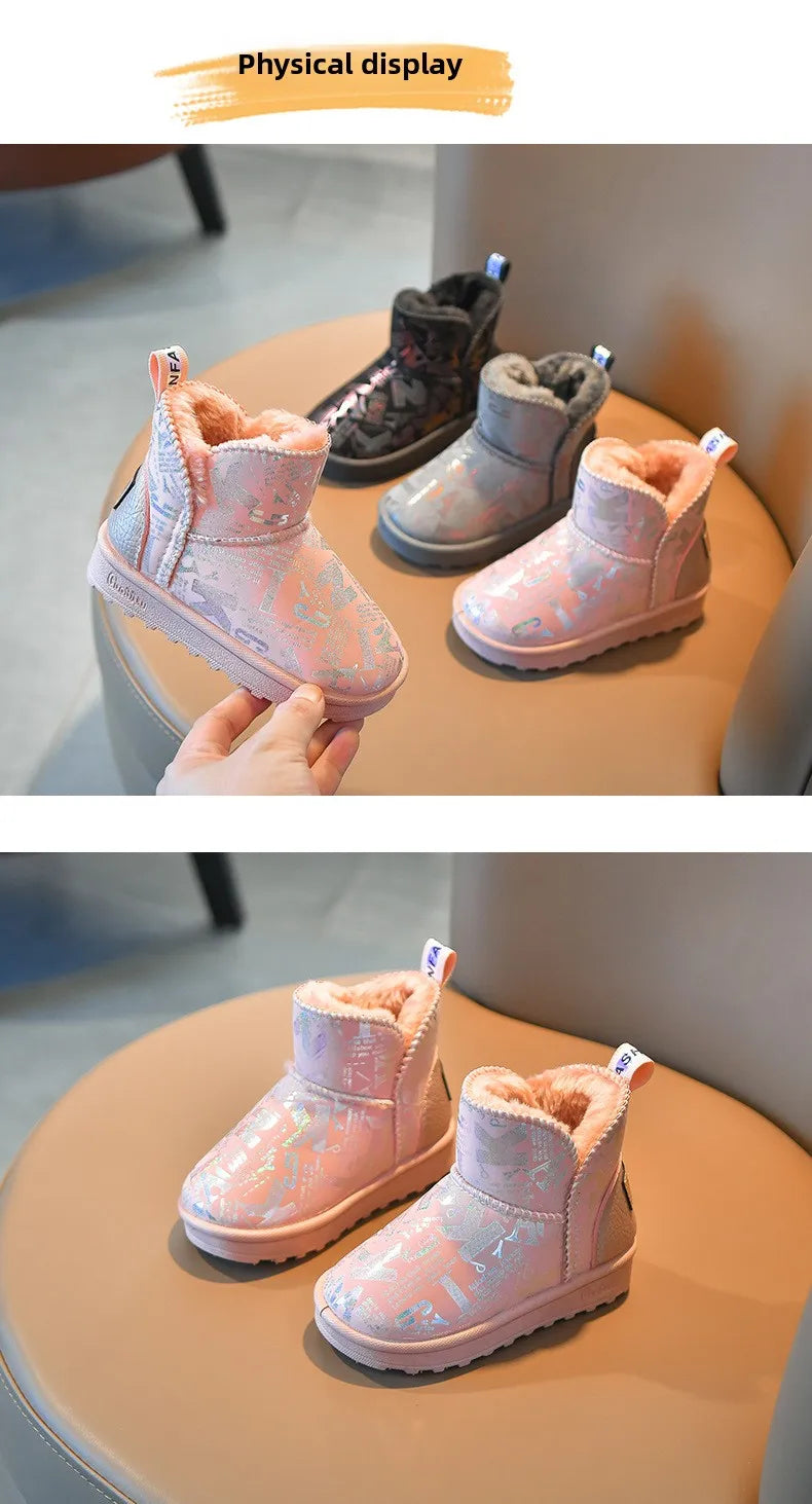 A pair of pink and purple fur-lined winter snow boots displayed on a light brown surface.