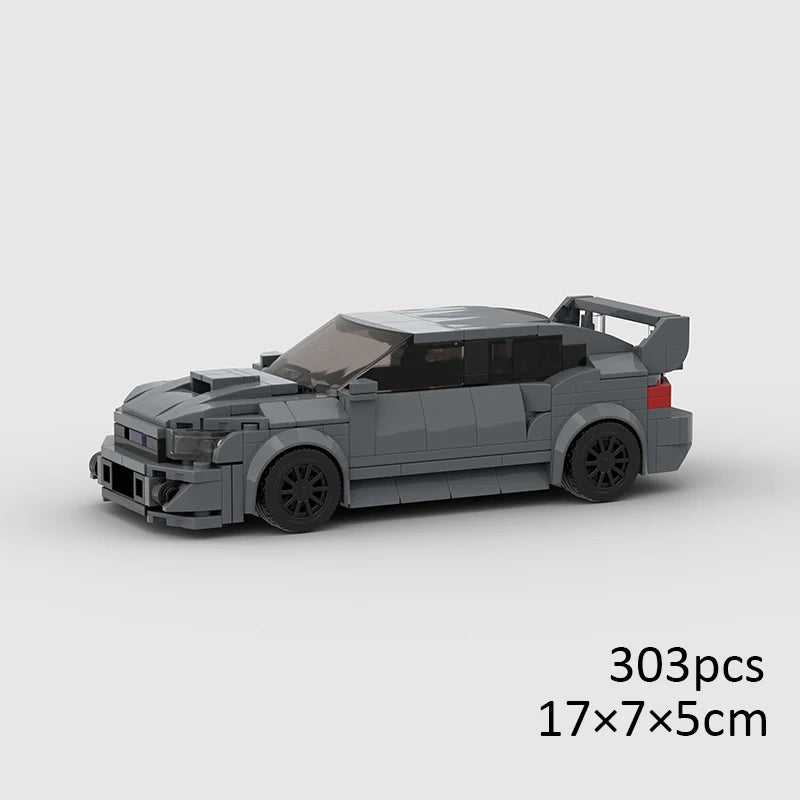 A gray building block model of a classic rally car with a black roof and racing features.