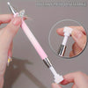 A hand is holding a pink and silver rotary mud discharge pen for nail art, demonstrating its use.