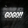 White text saying GOGO!! on a dark, blurry background.