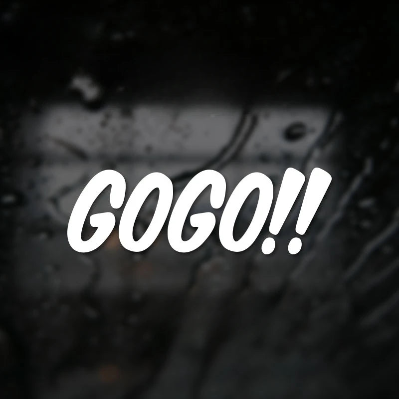 White text saying GOGO!! on a dark, blurry background.