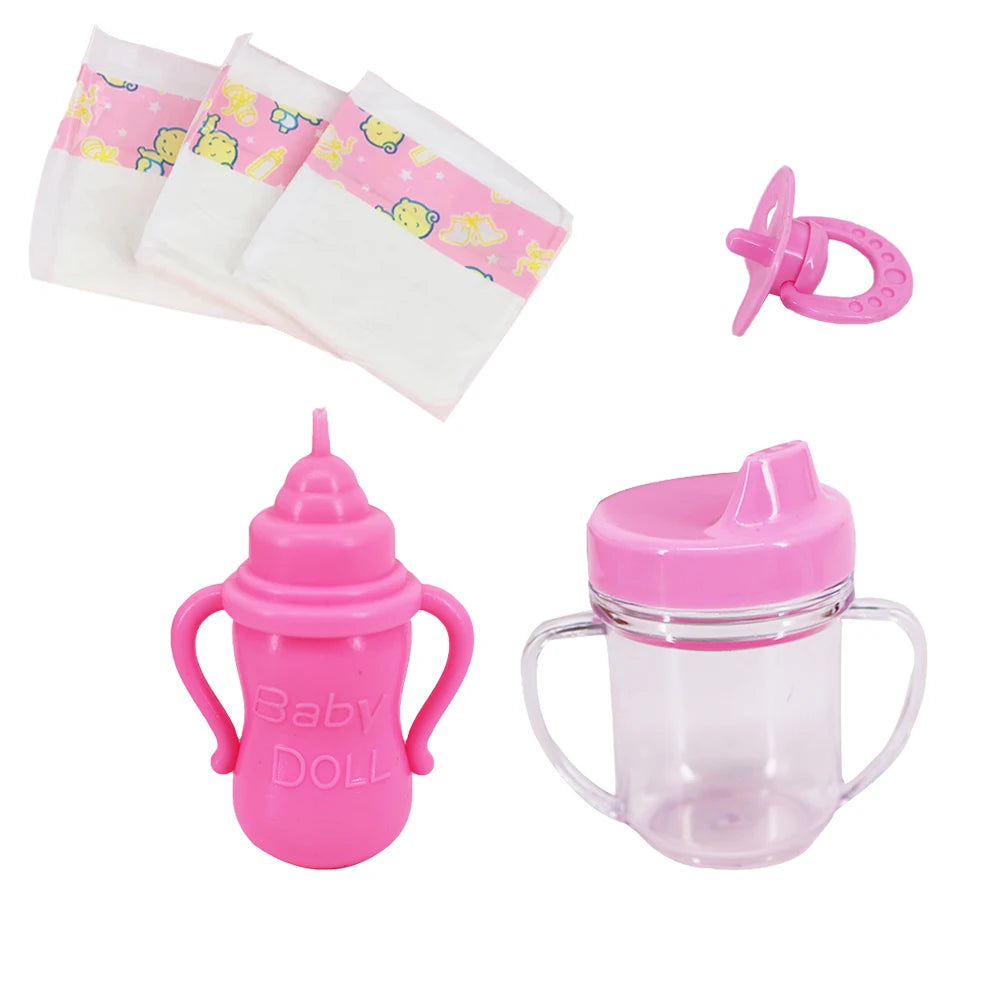 A set of pink feeding and care accessories for dolls, including a bottle, a silicone feeding tool, and pink cloth diapers.