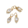 Gold-toned rhinestone heart charms for jewelry making, shown as separate pendants.