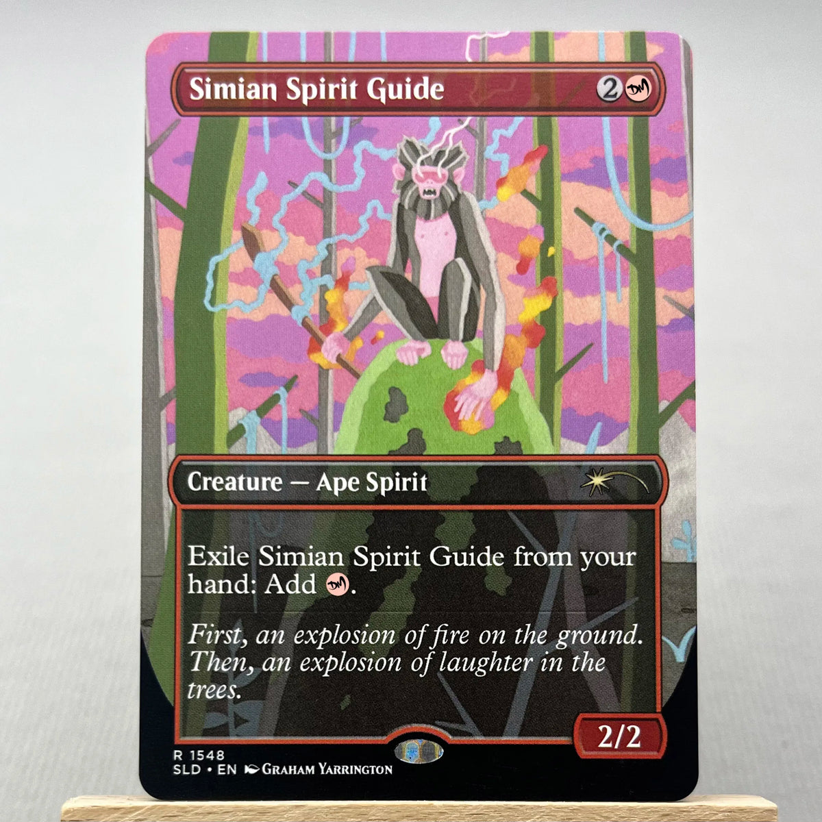A Magic: The Gathering card featuring the Ape Spirit creature card with a purple and green background