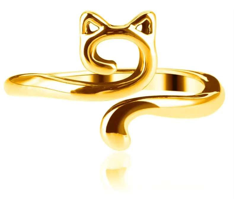 A gold-colored adjustable cat-ear yarn guide ring for knitting and crochet.