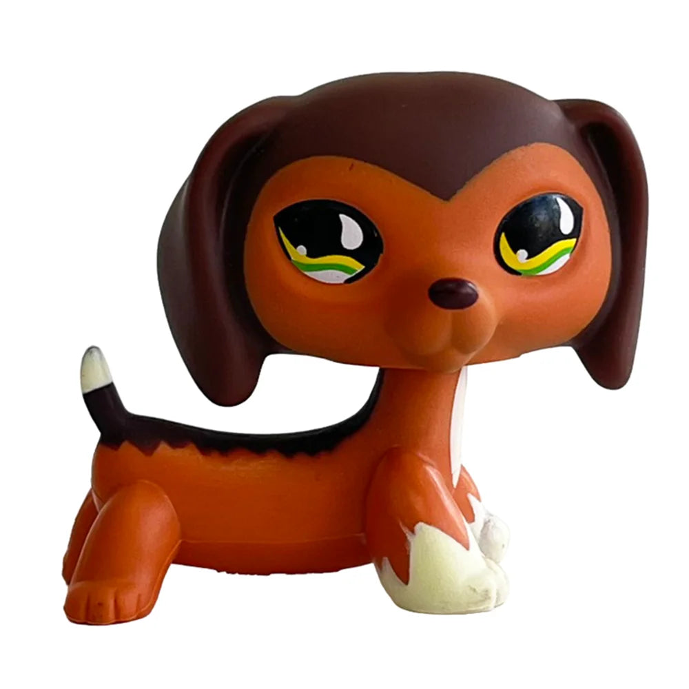 Sammler-Katzenpuppyfigur mit braun-orangefarfem Fell und großen gelben Augen