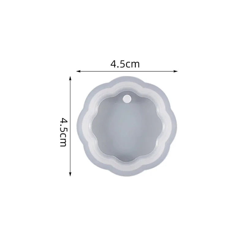 A light gray heart-shaped silicone mold for resin jewelry making, measuring 4.5cm high.