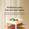A wooden pull stick board game featuring colored sticks and balls for multiplayer play.