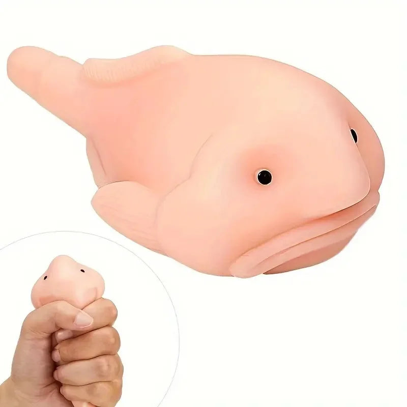 A pink squishy blobfish stress relief toy is shown next to a hand for scale.