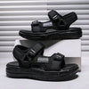 A pair of black OneGecom non-slip summer sport sandals displayed on a white box.
