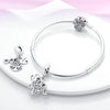 A silver heart charm for bracelets and necklaces displayed on a white background.