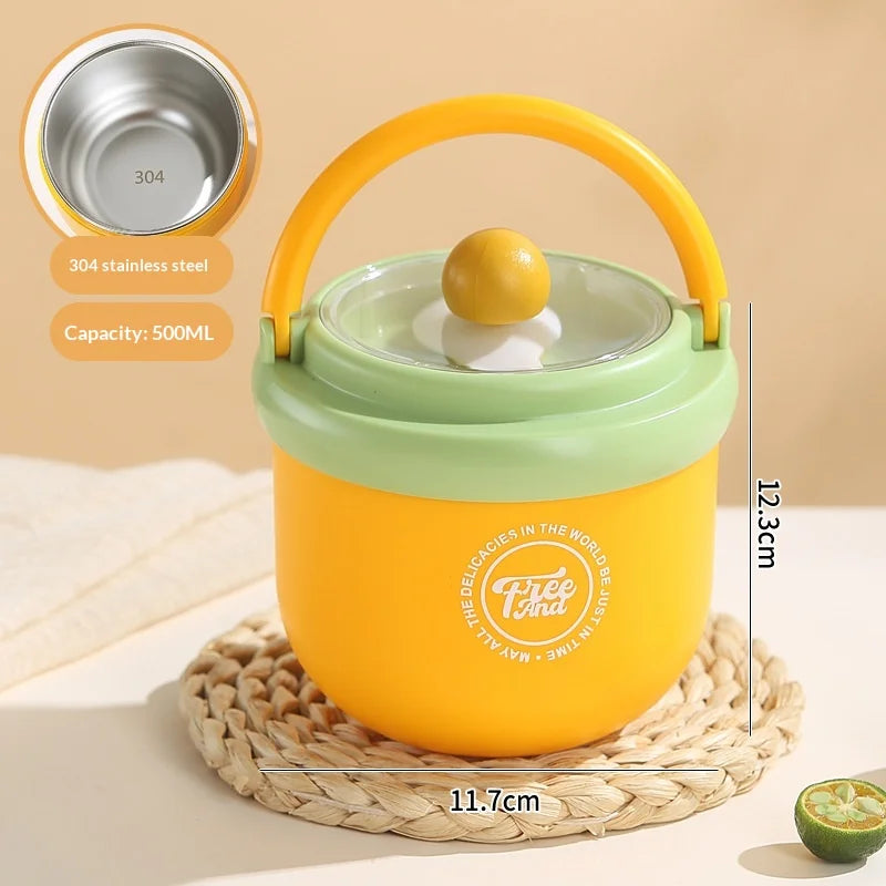 A yellow insulated stainless steel breakfast cup with a green lid and yellow handle resting on a woven mat.