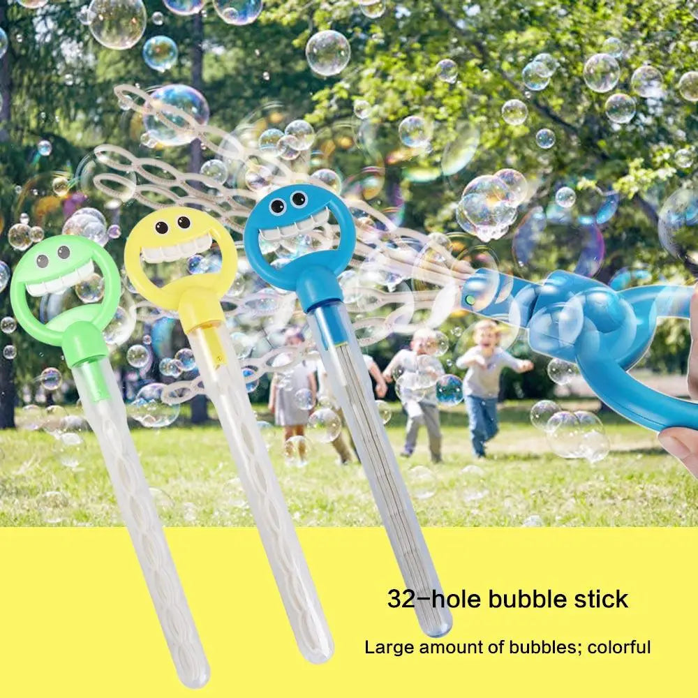 Three colorful 32-hole bubble sticks with smiling faces are shown amidst a shower of bubbles in an outdoor setting.