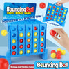 A blue bouncing ball shots board game organizer with colored balls, shown next to a hand holding a red ball.