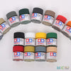 A collection of matte acrylic paint pots in various colors and shades for model kits and miniatures.