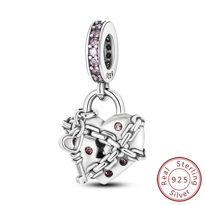 Sterling silver heart charm bead with pink and black stones, featuring an intertwined knot design.