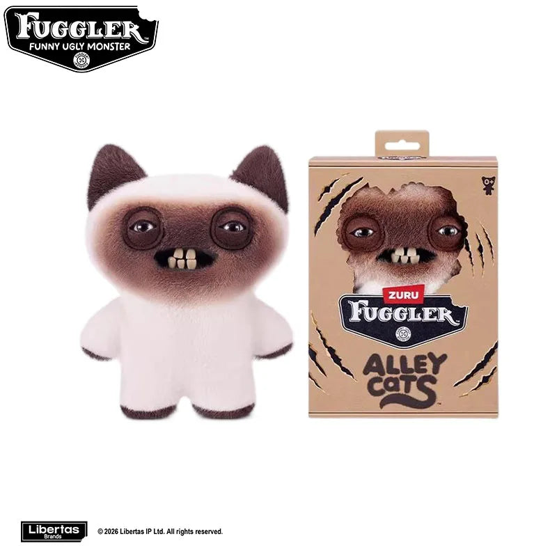 A plush toy of a monster with large eyes and teeth, packaged in a box.