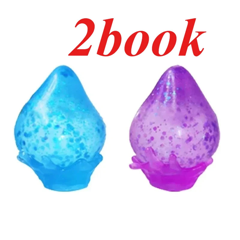Two glitter squishy toys, one blue and one purple, are shown against a white background.