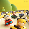 A yellow giraffe animal car toy is shown driving on a black and white checkered track.