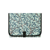 A portable foldable waterproof diaper changing pad with a blue and teal leaf pattern.