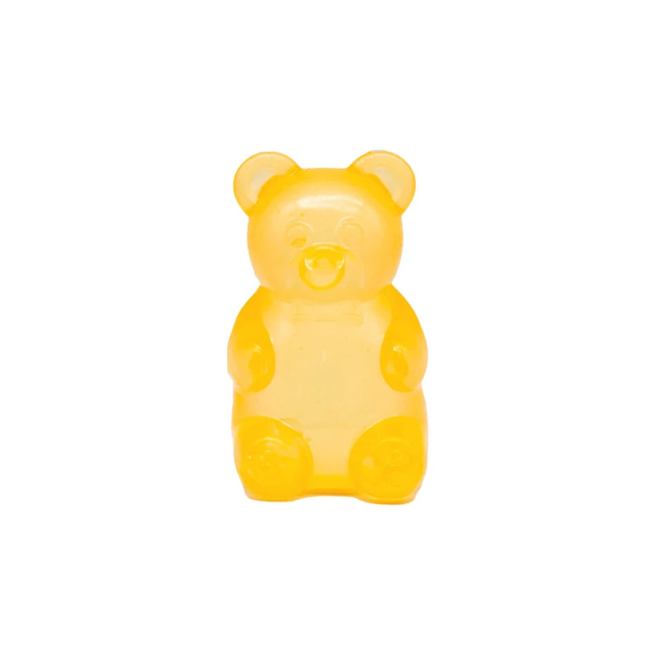 A bright yellow, soft rubber toy shaped like a bear for sensory play and stress relief.