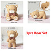 A set of three adorable bear figures in various poses including seated, standing, and lying down.