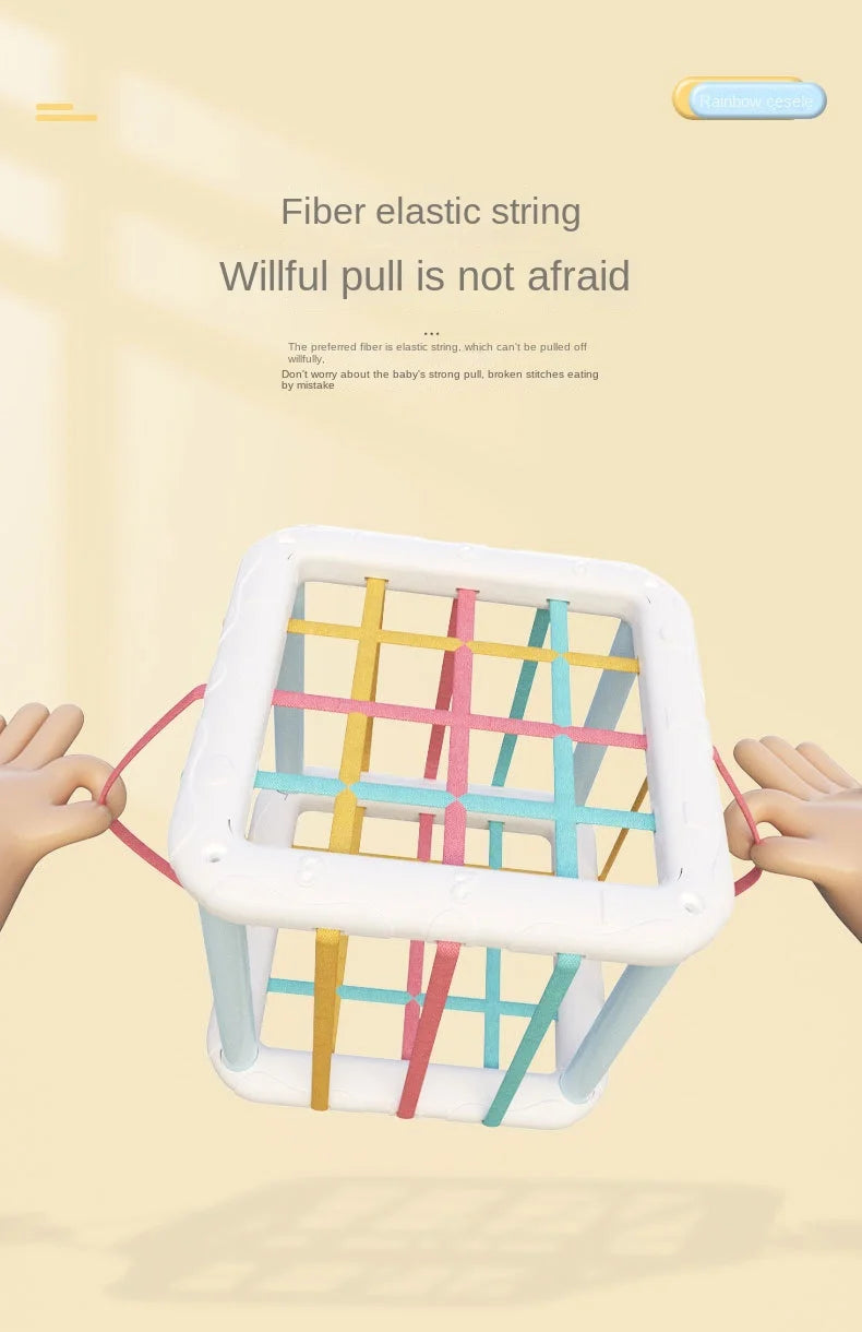 A white plastic frame holds colorful fiber elastic strings, demonstrating a sensory sorting block set for babies and toddlers