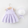 A purple floral print baby girl summer dress and sunhat set with a lavender bow detail.