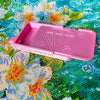 A pink diamond painting organizer tray with storage compartments is displayed on a colorful background.