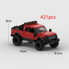 A red and black die-cast style off-road vehicle model built from 421 plastic pieces.
