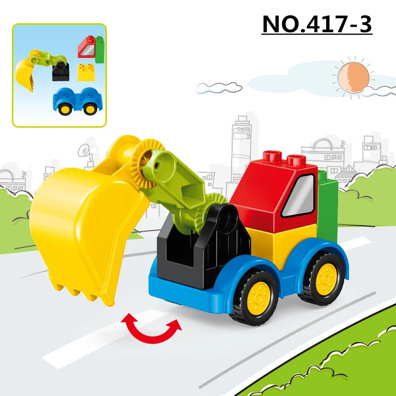 A yellow construction vehicle with a green scoop is shown on a road, next to building blocks.