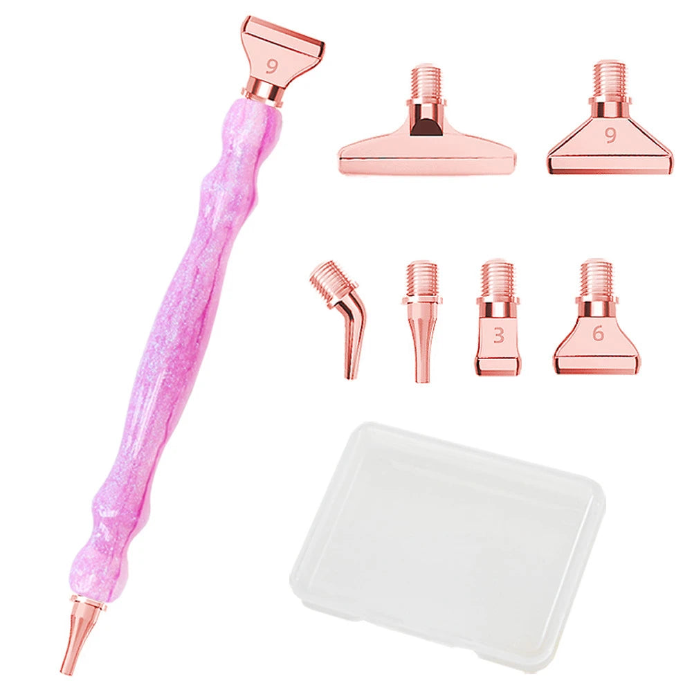 A set of rose gold resin diamond painting pens with various threaded dotting tips and a clear plastic tray