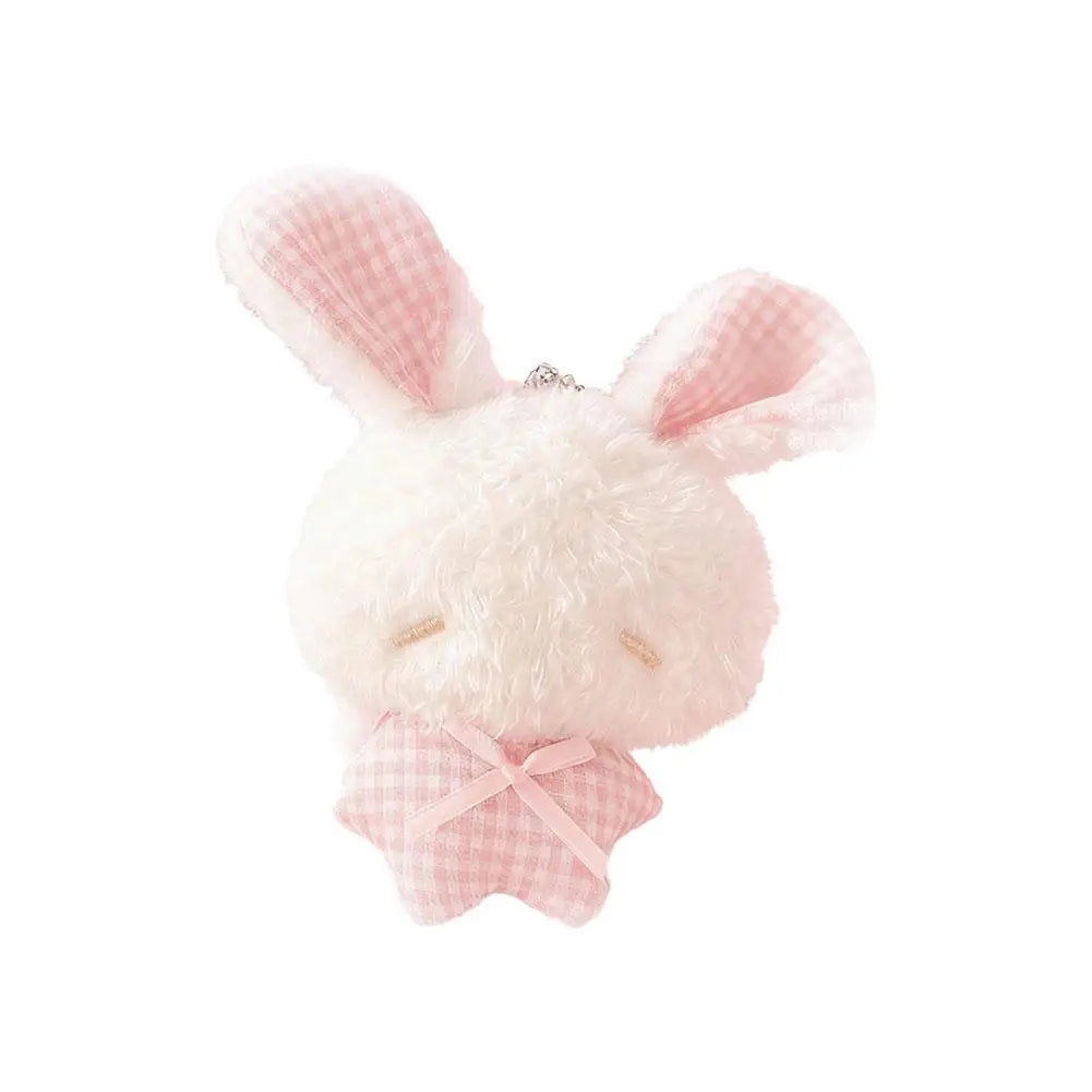 A fluffy pink bunny plush toy with pink checkered ears and a pink bow, designed as a keychain.