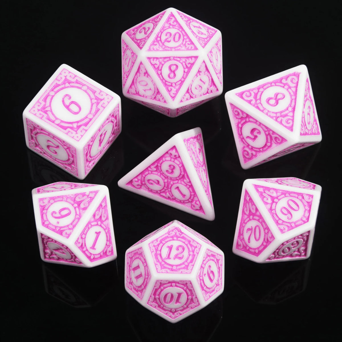 A set of pink polyhedral dice showing various numbers and geometric shapes on a black reflective surface.