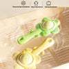 A light green and yellow 3-in-1 sensory teething rattle is shown on a silicone tray, demonstrating ultraviolet light disinfec