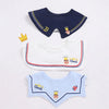 A set of three baby waterproof drool bibs featuring a navy blue design with gold accents and a light blue version.