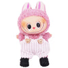 A pink Labubu plush doll wearing a pink hood and white strap pants with bear appliqués.