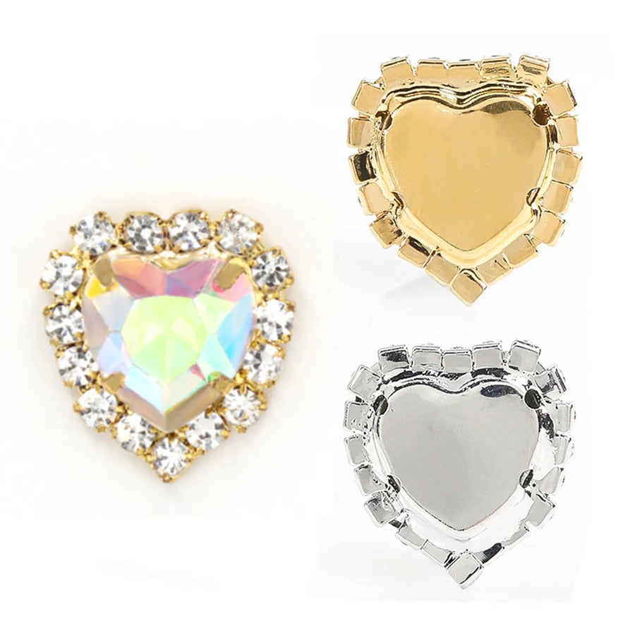 Two heart-shaped flatback sew-on rhinestones, one gold-toned and one silver-toned, for DIY crafts.