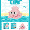 A box set of Marine Life building blocks featuring a pink penguin sea animal model.