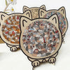 A set of three cat-shaped wooden jigsaw puzzles featuring various cats and kittens.