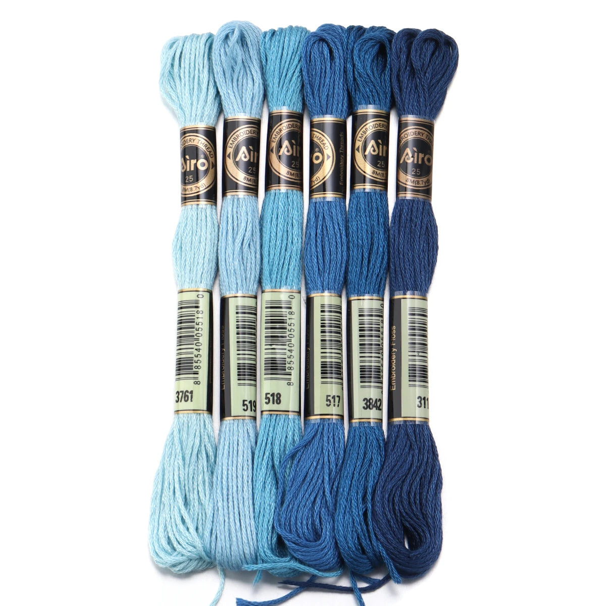 A set of six skeins of vibrant embroidery thread in various shades of blue and teal for cross stitch and DIY crafts
