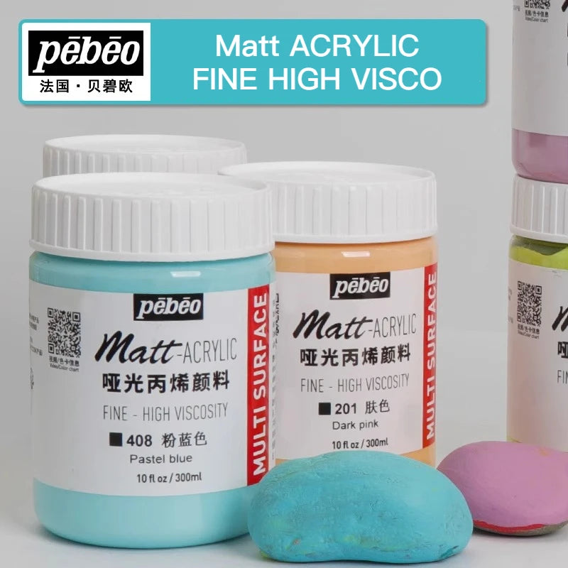 Bottles of Pebéo Matt Acrylic Fine High Visco paint in pastel blue and orange, with a pink stone.