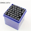 A purple plastic box filled with 36 carbon steel number and letter stamping pins.