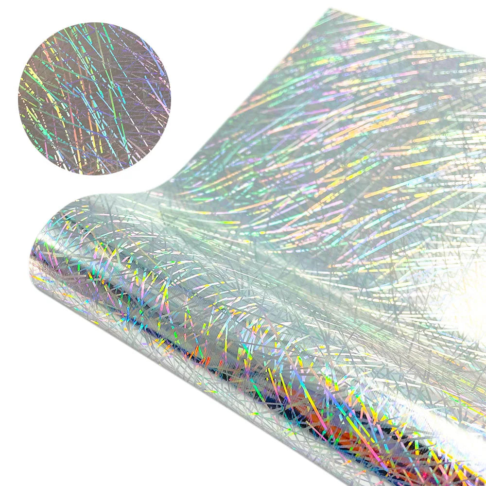A close-up view of holographic glitter heat transfer vinyl showing iridescent colors and fine fibers.