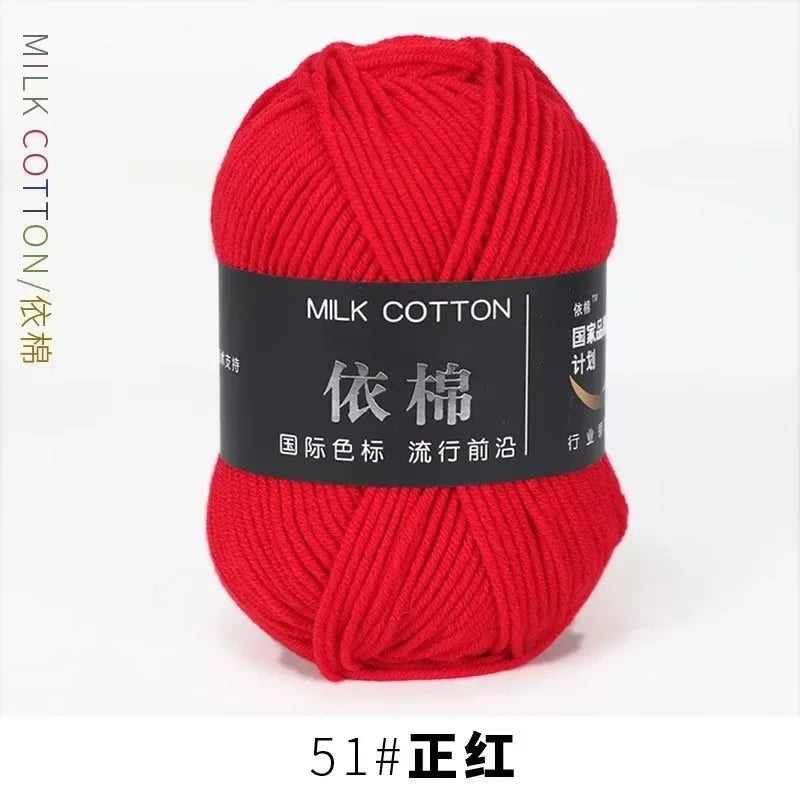 A ball of bright red milk cotton yarn labeled 51# 正红 for knitting and crochet.
