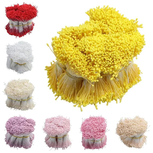 A collection of mini pearl stamen floral decorations in various shades including red, white, and yellow.