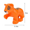 An orange plastic lion figurine used as a building block for children.